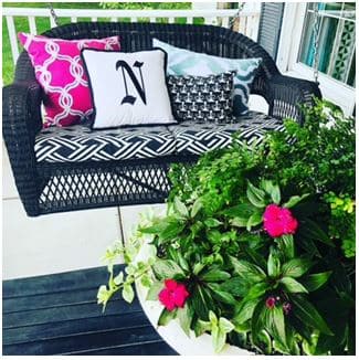 A porch swing with pillows: front porch ideas