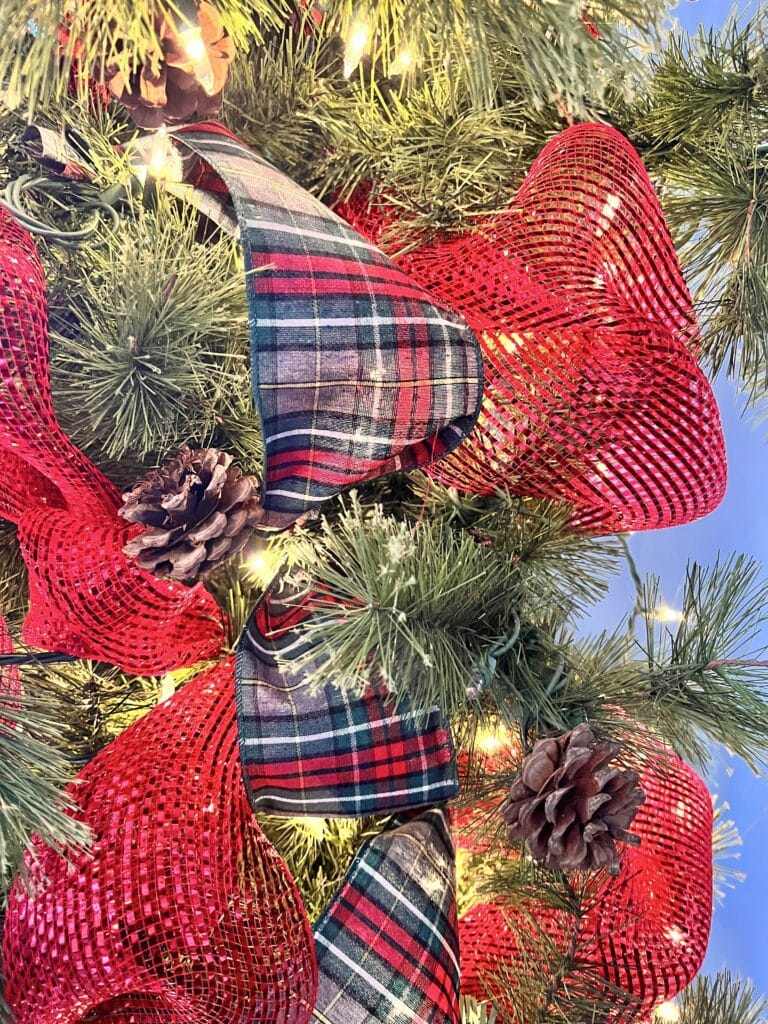 Plaid ribbon in a Christmas tree.