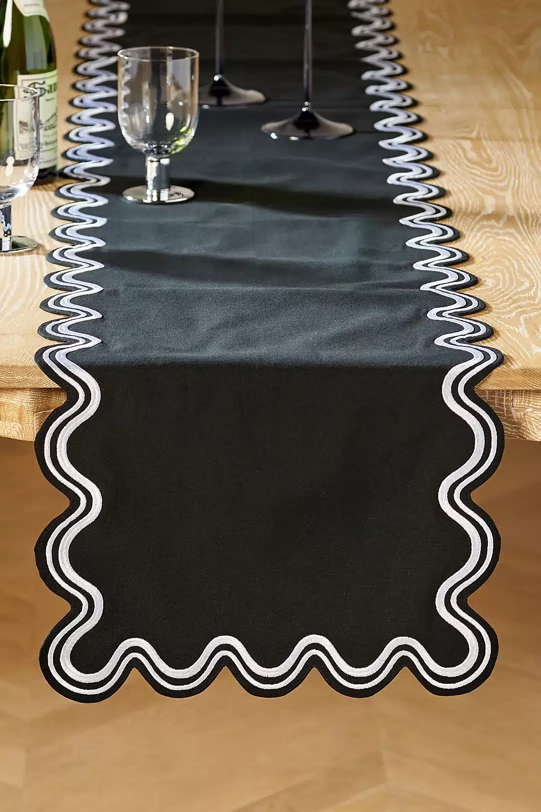 A black and white table runner from Antrhopologie.