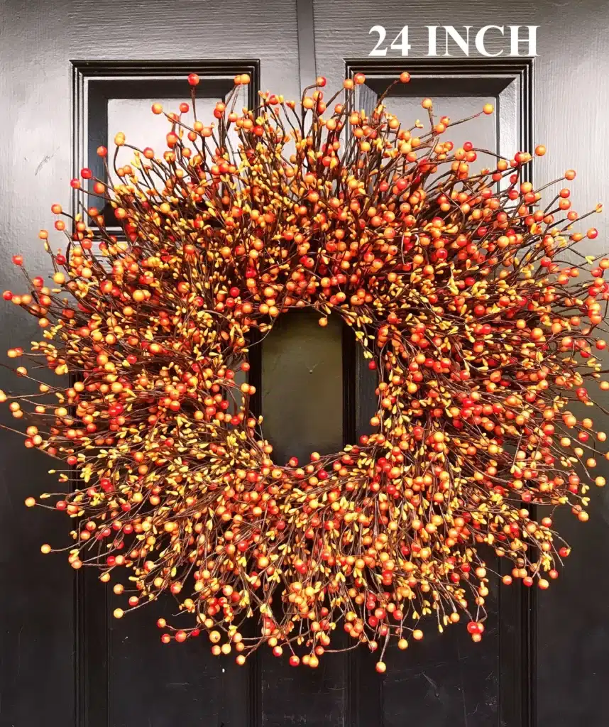 Gold and orange pip berry Fall wreaths for the front door.