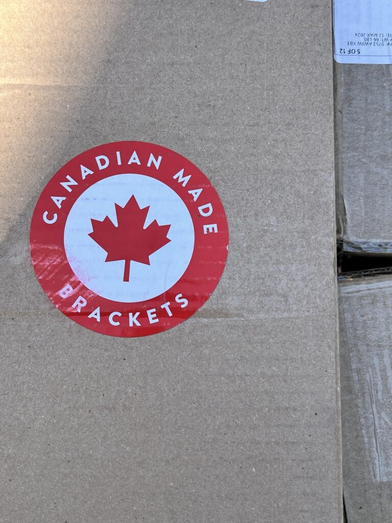 A box with the label "Canadian Made Brackets"