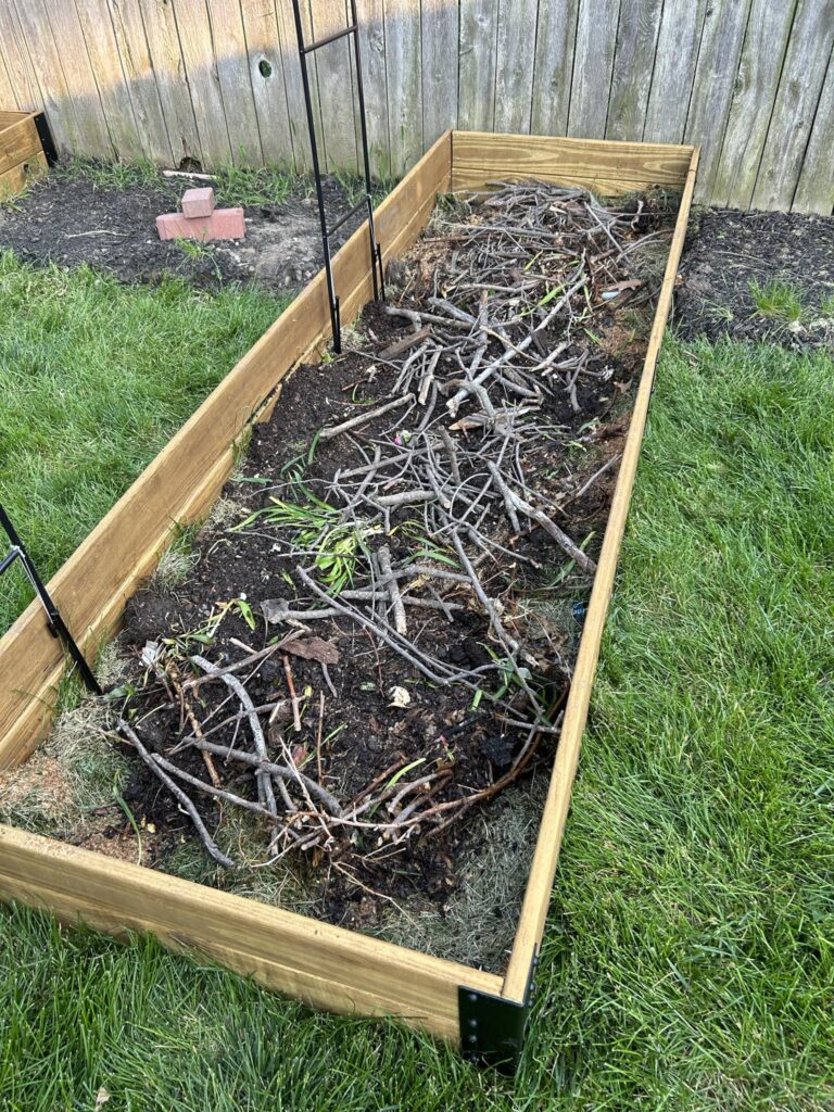 An easy raised garden bed full of organic matter.