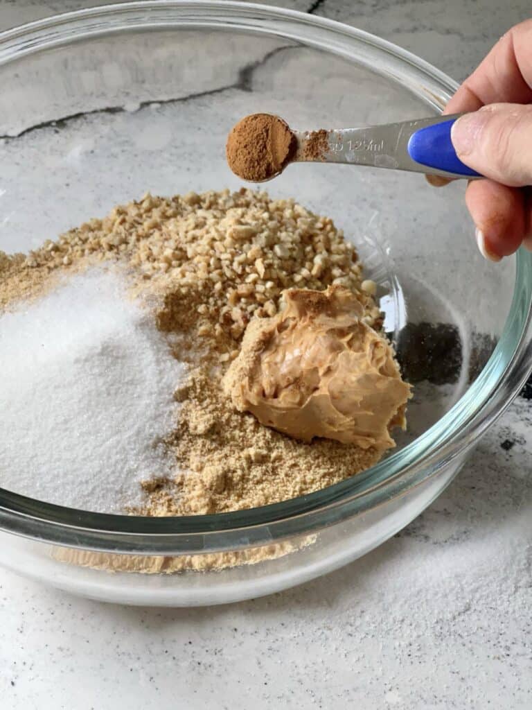 Mixing graham cracker coating for crunchy Ice Cream Balls.
