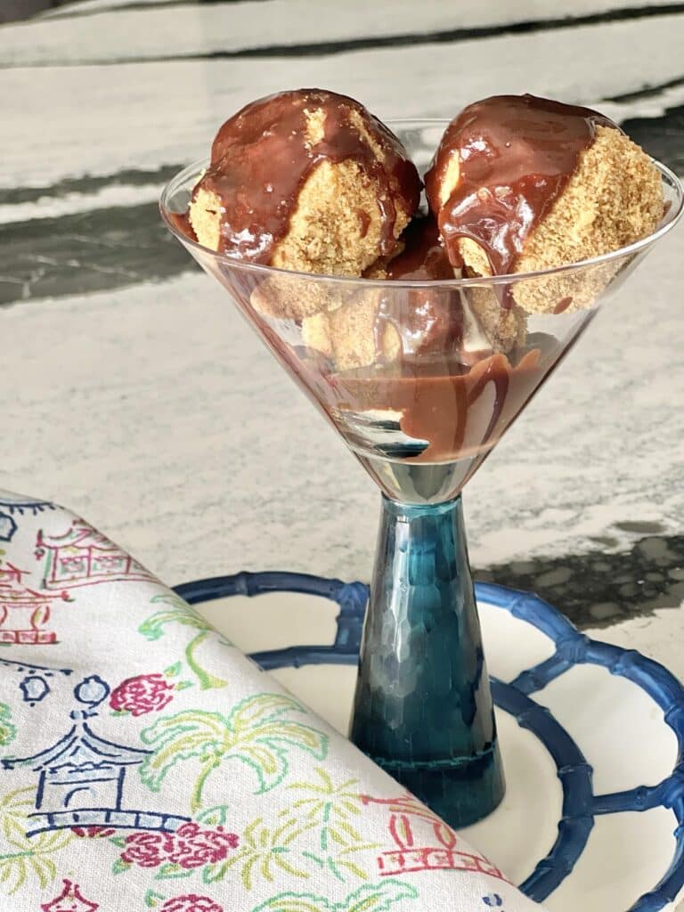 Crunch Ice Cream Balls covered with hot fudge sauce.