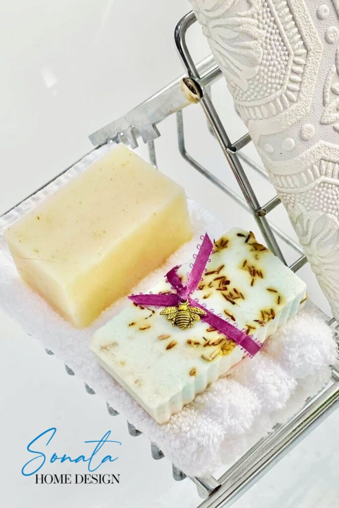 Spa bath soaps in a tray in a luxurious bath.