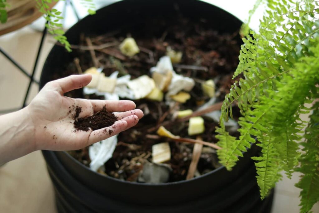 Composting coffee grounds.