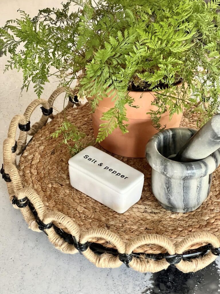 DIY Lazy Susan covered with jute twine and leather lacing.