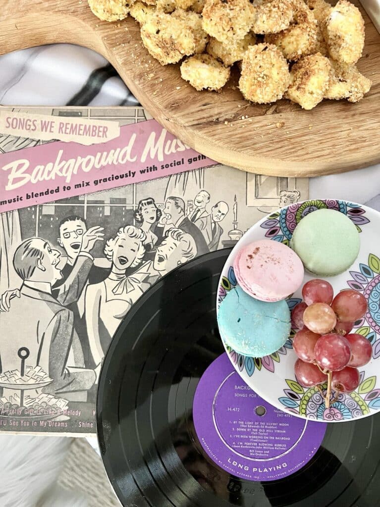 A vintage record album decorating a karaoke party table.