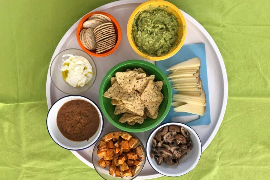 Snacks in bowls on a lazy Susan.