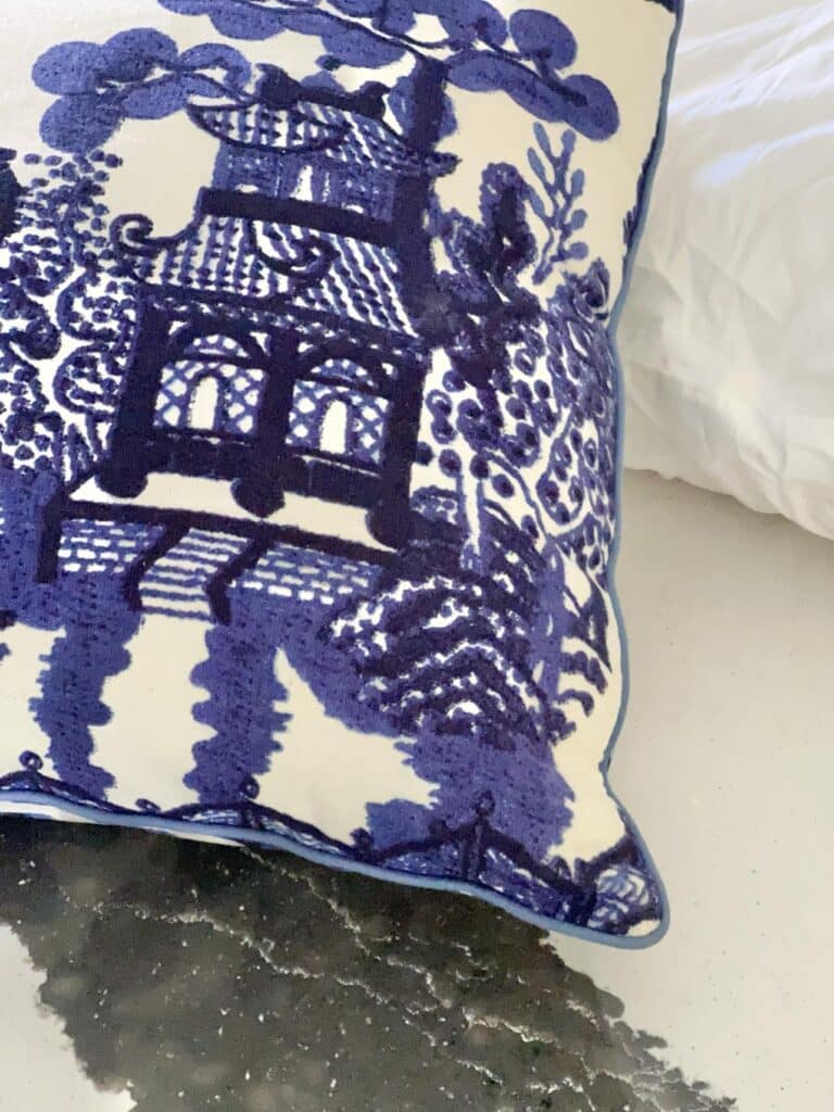 A blue and white throw pillow.