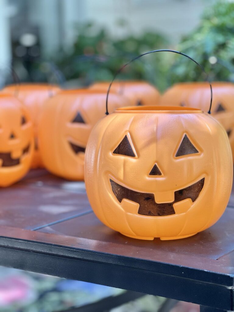 orange trick or treat pumpkin pails.