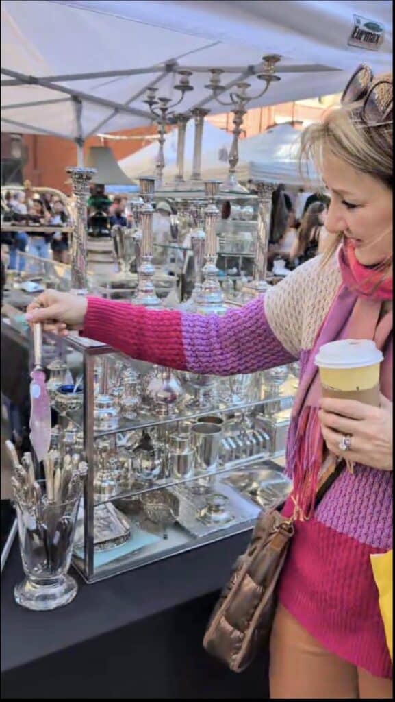 woman looking at silver cake knife.