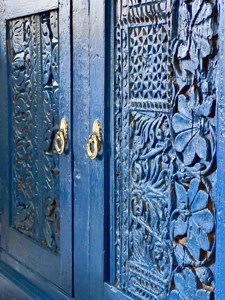 Painted doors on a credenza furniture piece.