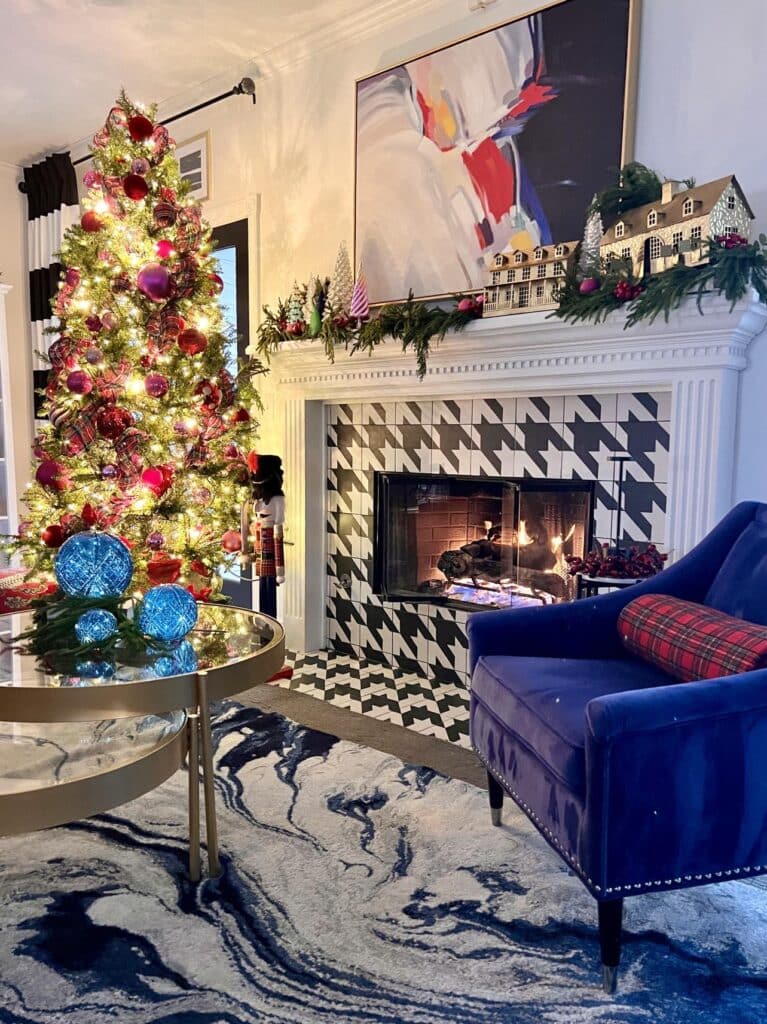 This Christmas home tour include a houndstooth fireplace decorated with a Christmas plaid theme.