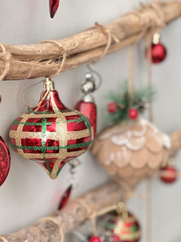 Plaid ornament on a wall Christmas tree.