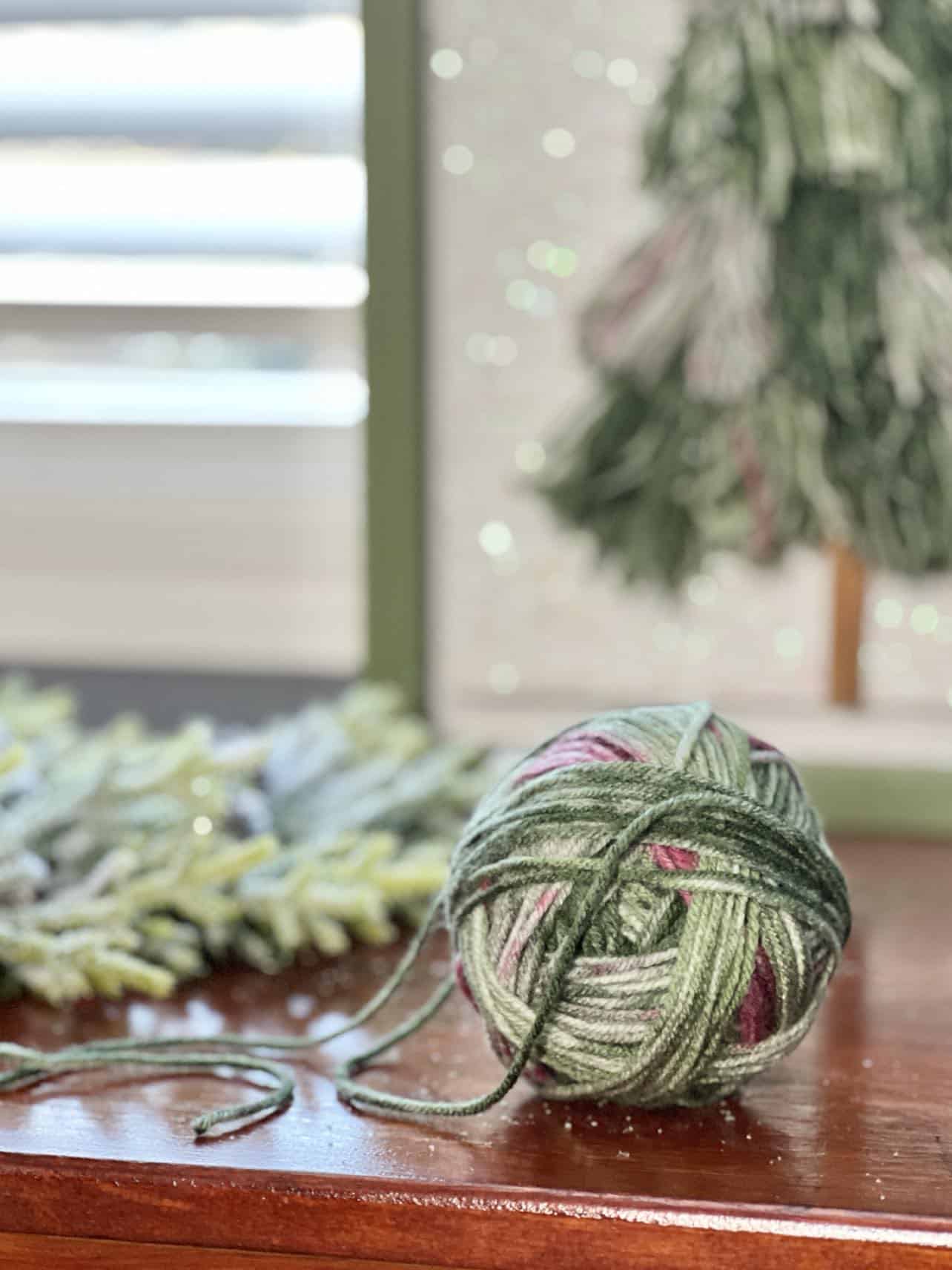 From Yarn to Charm: Easy DIY Christmas Tree Tassel Wall Art