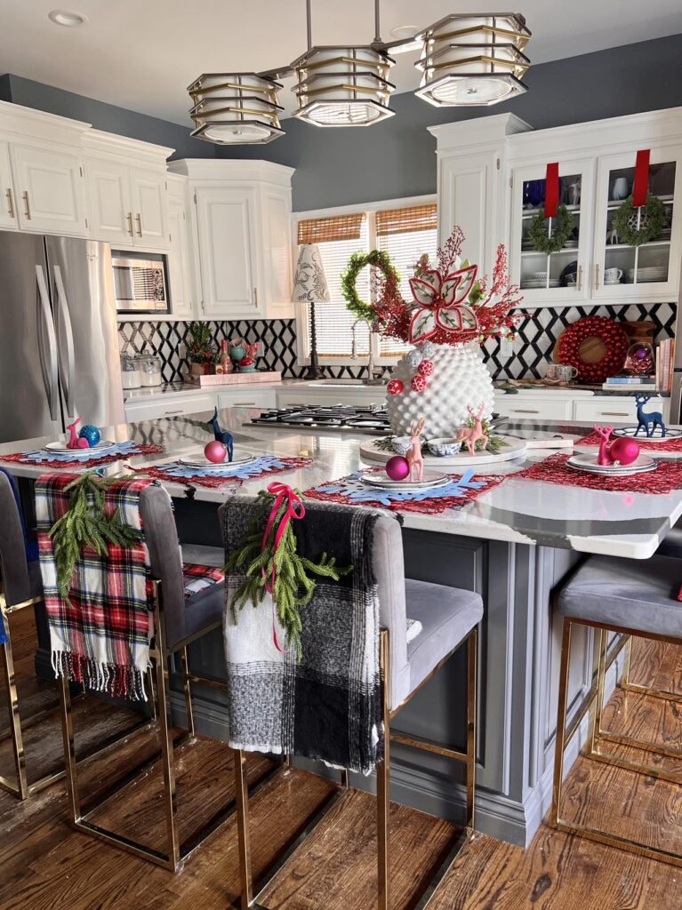 A kitchen decorated for a Christmas holiday home tour.