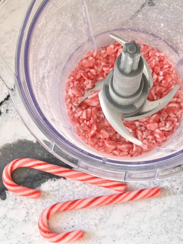 Crushed candy canes in a food processor.