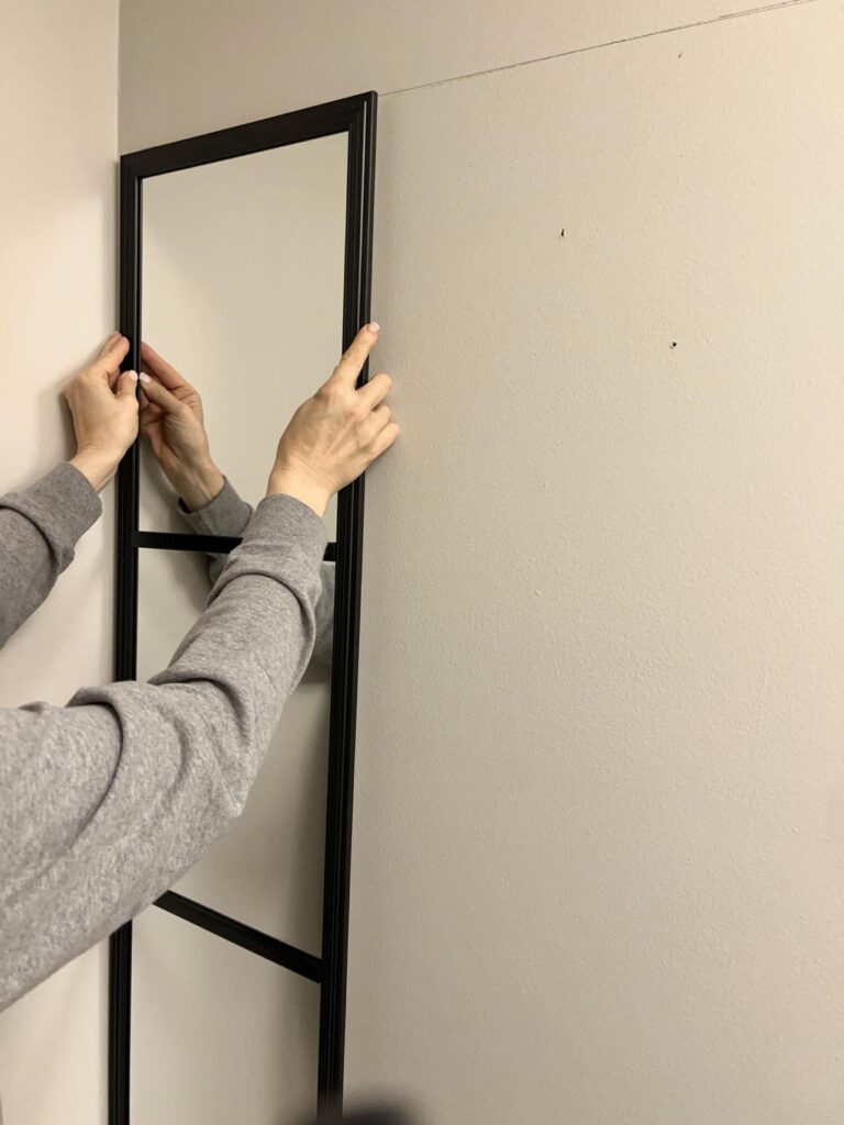 Hanging the first mirror for a grid mirror hack.