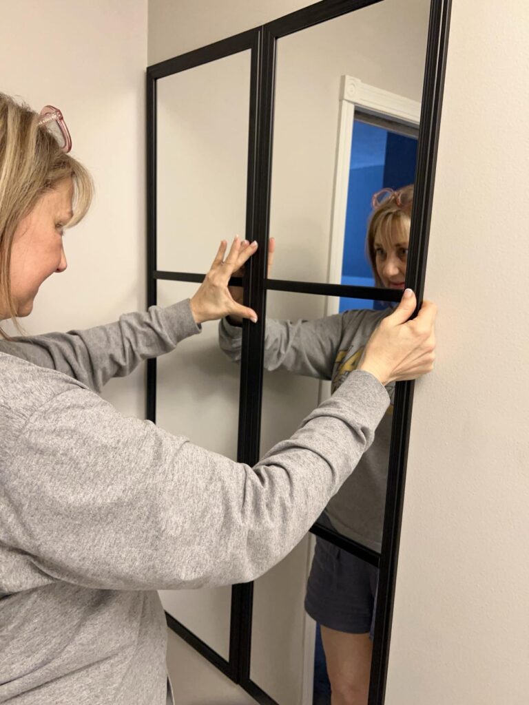 Hanging a second mirror for a grid mirror hack.