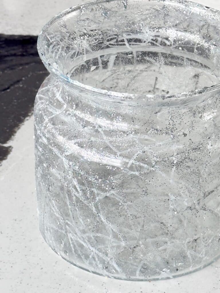 A glass vase with DIY crackle glass finish effect.