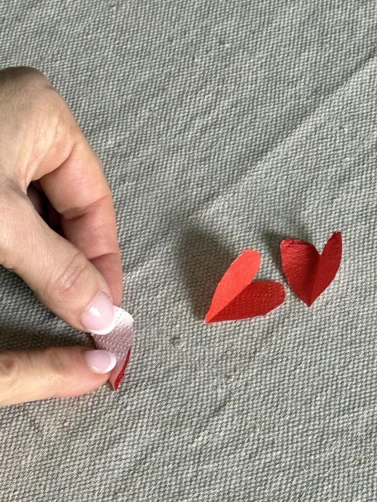 folding paper hearts.