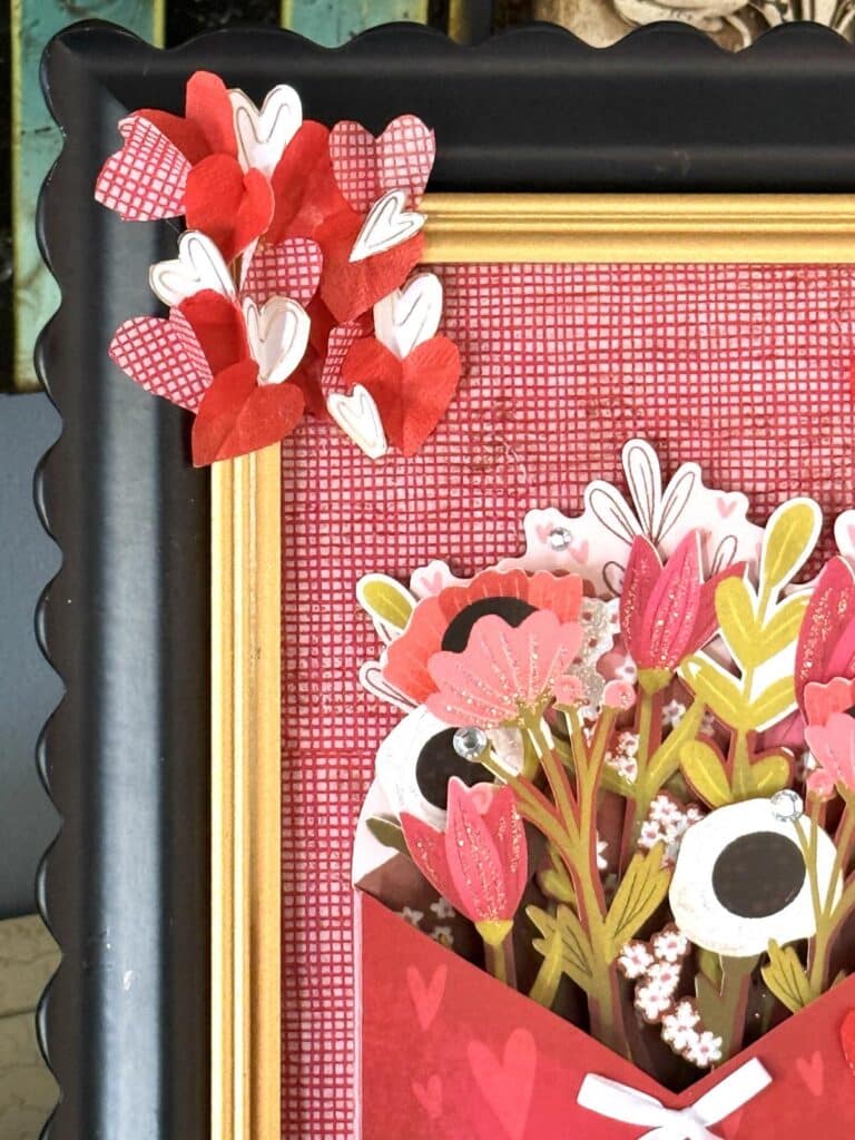 DIY 3-D Valentine Art with hearts and flowers.