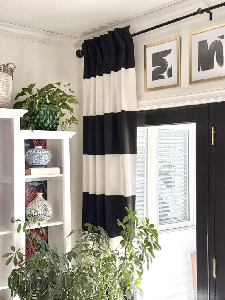 Curtains hung by the ceiling solve a decorating mistake.